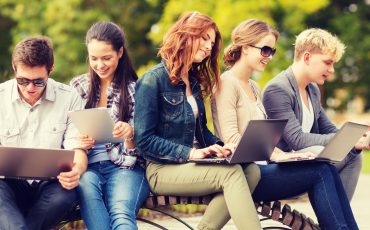 students-or-teenagers-with-laptop-and-tablet-computers