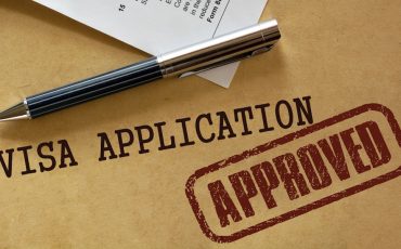 Visa application approved stamp.