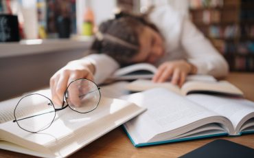 student-girl-felt-asleep-studying-among-many-books-1024x682